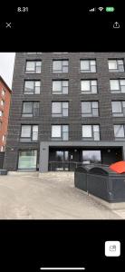 a large brick building with a lot of windows at Studio Lintulammentie in Oulu