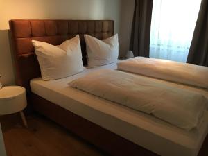 Posteľ alebo postele v izbe v ubytovaní Apartment Enzinger