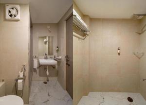 Un baño con lavabo, inodoro y ducha. en Rajputana Heritage Haveli, en Jodhpur 25 fotos más