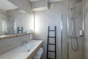 Ένα μπάνιο στο Les Afforêts Le Loft