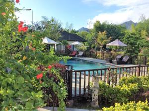 Vista de la piscina de Taman Dewi Sri Villa et Bungalow o alrededores