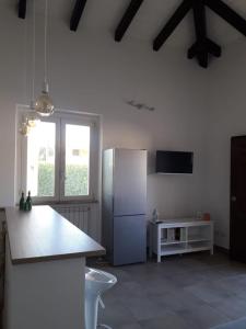 Kuchyň nebo kuchyňský kout v ubytování Villetta al mare con ampio giardino privato