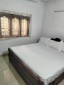 En eller flere senge i et værelse på Green House Resort + 3 billeder