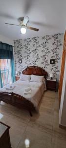 Ένα ή περισσότερα κρεβάτια σε δωμάτιο στο Apartamento Calle Real