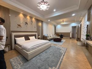 En eller flere senge i et værelse på The Punjoy Inn