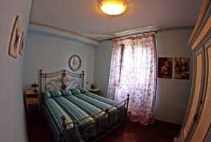 Ett rum på Appartamento Vacanze Magnolia e Glicine