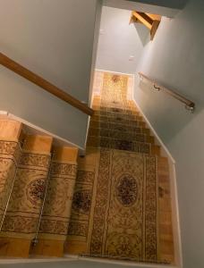 an image of a staircase with a tile floor at Spacious 3-Bedroom Family Home in Oxford in Oxford