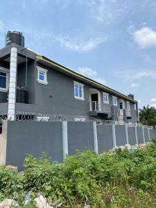 a house on top of a fence at EMKO House in Ilorin