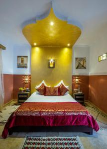 Postelja oz. postelje v sobi nastanitve Riad Nesma Suites & Spa