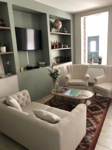 Posezení v ubytování Maison de vacances de charme 8-10 personnes + 46 fotografií