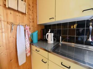 a kitchen with a sink and a counter top at Apartment in Trans Village in Trans +24 photos