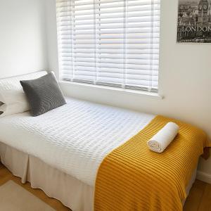 En eller flere senge i et værelse på Spacious 3BR House - Hot Tub - Near Castle, National Justice Museum, Lace Market - Free WiFi & Parking - Sleeps 6