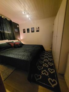 En eller flere senge i et værelse på Central apartment in Breivika, Tromsø + 14 billeder