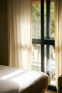 Postel nebo postele na pokoji v ubytování The Corner House