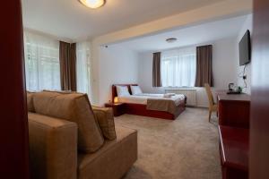 Postel nebo postele na pokoji v ubytování Divski Wellness Resort