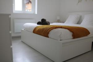 Ένα ή περισσότερα κρεβάτια σε δωμάτιο στο L'illwald I