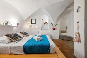 Postel nebo postele na pokoji v ubytování LES SABLETTES - Bord de Mer - Vieille Ville - Parking Privé