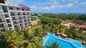 an aerial view of a resort with a swimming pool at Malika Nungwi Hotel in Nungwi
