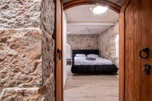 Ένα ή περισσότερα κρεβάτια σε δωμάτιο στο City Center Luxury