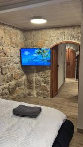 Ένα ή περισσότερα κρεβάτια σε δωμάτιο στο City Center Luxury