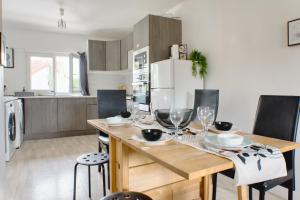 Η κουζίνα ή μικρή κουζίνα στο Appartement Spacieux 80 m2