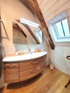 a bathroom with a sink and a mirror at La grange  +41 photos