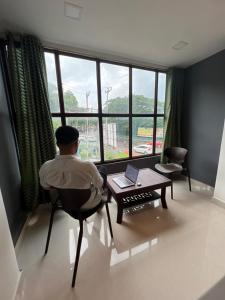 Χώρος καθιστικού στο Auraville Homestay