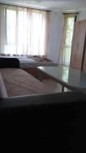 A bed or beds in a room at Apartment's Pita & Mare