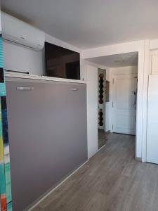 TV a/nebo společenská místnost v ubytování PlayaMar