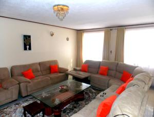 Photo de la galerie de l'établissement Cozy Corner Ensuite Near SGR &JKIA, Syokimau, à Syokimau