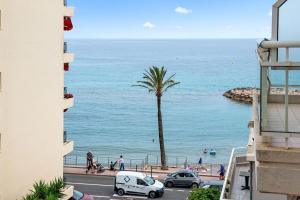 a view of the ocean from a building at RIVIERA PRESTIGE - Front de Mer - Terrasse - Parking in Roquebrune-Cap-Martin