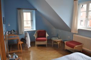 Posezení v ubytování Hotel Cramer Bed & Breakfast