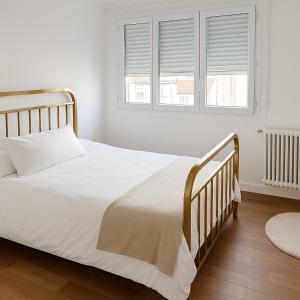 Postel nebo postele na pokoji v ubytování Le Monlahaye, cozy & bright