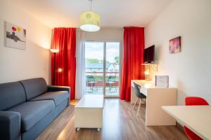 Posezení v ubytování Alezan Hôtel & Résidence
