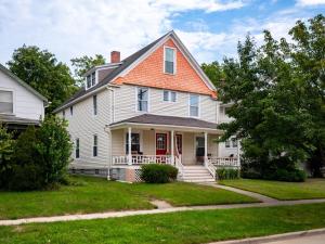 a white house with an orange roof at Historical District,Fully equipped,3 Beds,Sleeps 6 in Bedford