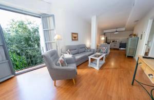 Гостиная зона в 180Home COQUETO APARTAMENTO EN CALLE SIERPES