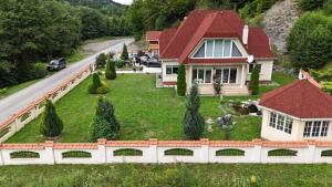 a model of a house with a yard at Lekic B&B in Kovačica