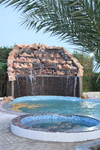 Bazén v ubytování Nature lover resort villas nebo v jeho okolí