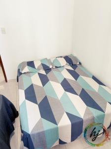 Ένα ή περισσότερα κρεβάτια σε δωμάτιο στο Ilhas de Creta 302