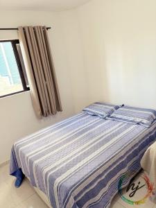 Ένα ή περισσότερα κρεβάτια σε δωμάτιο στο Ilhas de Creta 302 +6 φωτογραφίες