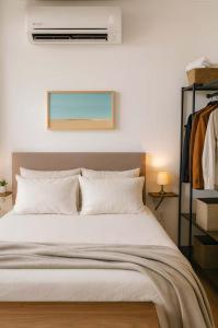 Postel nebo postele na pokoji v ubytování Beautiful condo with 4 pools and roofgarden + 27 fotografií