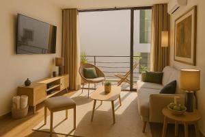 Posezení v ubytování Beautiful condo with 4 pools and roofgarden