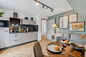 Η κουζίνα ή μικρή κουζίνα στο AT WEINMEISTER - TalPark - direkt am Kurpark und Reha-Zentrum