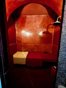 an overhead view of a room with a bench at Riad la Cigale in Marrakesh +100 photos