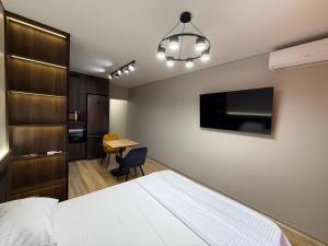 Μια τηλεόραση ή/και κέντρο ψυχαγωγίας στο ЖК Новий Автограф