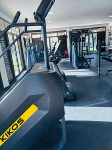 a gym with treadmills and a treadmill at Manhattan Beach Riviera 202 By AM in Aquiraz