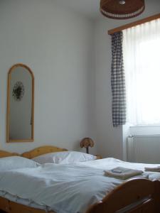 Postel nebo postele na pokoji v ubytování Hotel Filippi
