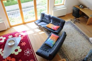 Posezení v ubytování Apartment Dachgalerie 110 m2
