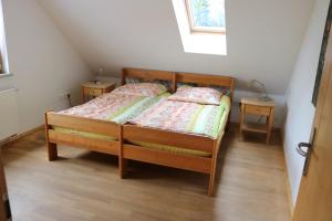 Postel nebo postele na pokoji v ubytování Apartment Dachgalerie 110 m2