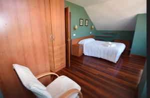 En eller flere senge i et værelse på Apartamento Luris